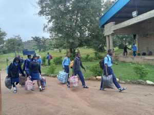 Messiah College students heading to their bus.